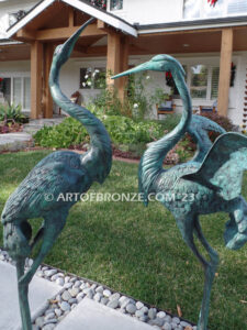 Heron Pair lost wax casting of pair of cranes for fountain