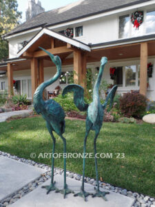 Heron Pair lost wax casting of pair of cranes for fountain