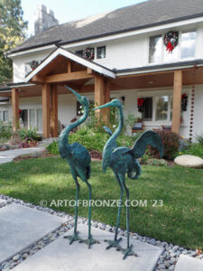 Heron Pair lost wax casting of pair of cranes for fountain