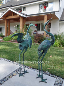 Heron Pair lost wax casting of pair of cranes for fountain