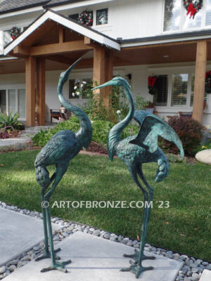 Heron Pair lost wax casting of pair of cranes for fountain