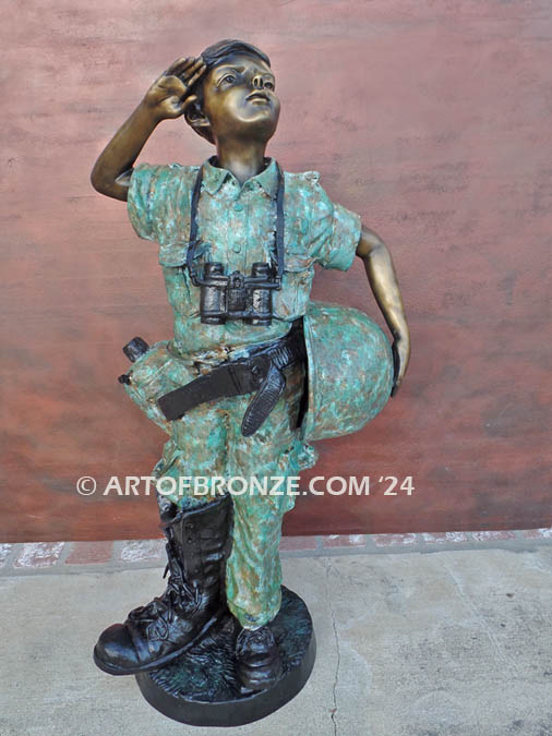 Home of the Brave bronze sculpture of saluting boy dressed up playing soldier