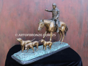 Hunting Day bronze sculpture of rider and scent hounds fox hunting