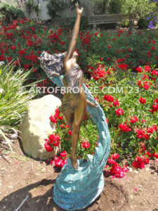 Inspirare bronze sculpture of exotic woman reaching to the heavens for private gallery or public display