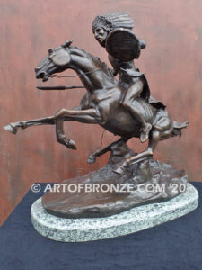 Into Battle Native American Indian warrior riding horseback bronze sculpture