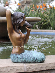 Bronze mermaid sculpture holding oyster shell for pond, pool or aquatic display