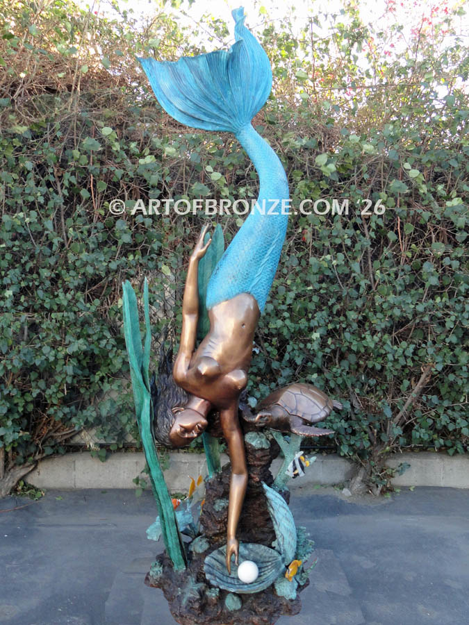 Bronze mermaid fine art statue holding oyster shell for pond, pool or aquatic display