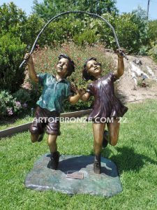 Jump Rope outdoor large bronze sculpture of girl and boy jumping rope