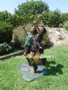 Jump Rope outdoor large bronze sculpture of girl and boy jumping rope