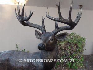 King of the Forest bronze buck sculpture of standing white-tailed deer outdoor monument