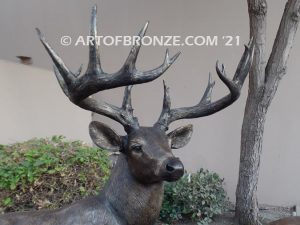 King of the Forest bronze buck sculpture of standing white-tailed deer outdoor monument
