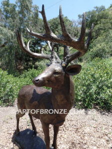 King of the Forest bronze buck sculpture of standing white-tailed deer outdoor monument