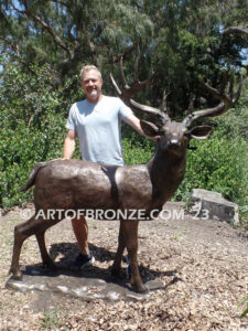 King of the Forest bronze buck sculpture of standing white-tailed deer outdoor monument