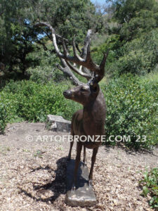 King of the Forest bronze buck sculpture of standing white-tailed deer outdoor monument