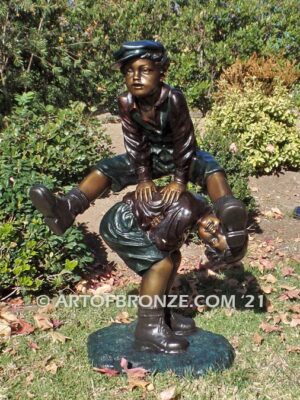 Leapfrog bronze sculpture of boy jumping over his brother