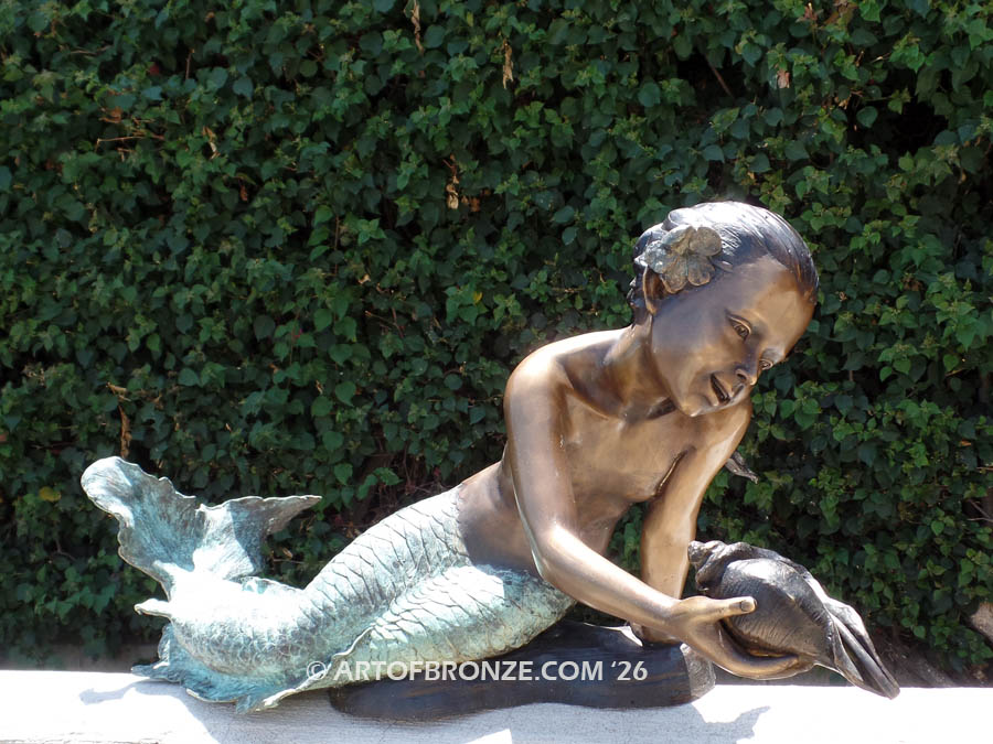 Bronze mermaid sculpture holding oyster shell for pond, pool or aquatic display