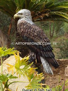 Lone Sentinel bronze sculpture of eagle resting on branch monument for public art or veterans memorial