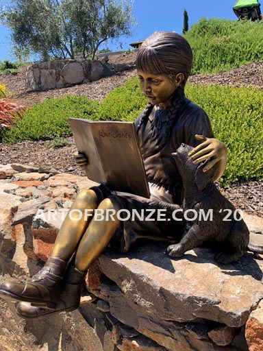 Love and Devotion sculpture of young reader girl with dog and book