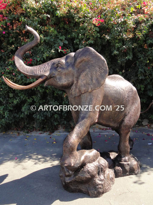 Magnificent One charging elephant bronze sculpture monument