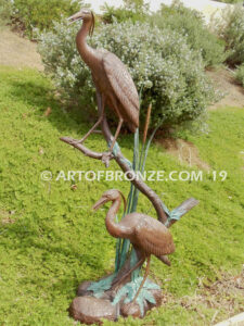 Mashland Waders lost wax casting of two heron cranes resting on branch at tranquil residence