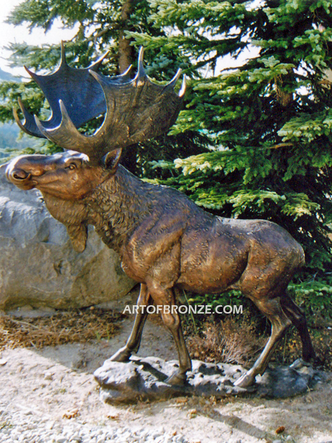 Northern Monarch heroic bronze bull moose standing on rocky base design with head raised