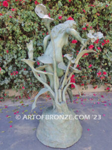 Nouveau composition monumental outdoor bronze statue of beautiful nude female standing with flowers