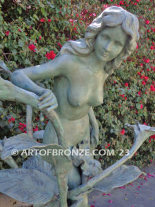 Nouveau composition monumental outdoor bronze statue of beautiful nude female standing with flowers