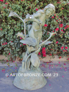 Nouveau composition monumental outdoor bronze statue of beautiful nude female standing with flowers