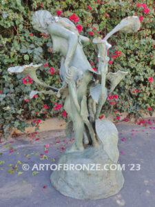 Nouveau composition monumental outdoor bronze statue of beautiful nude female standing with flowers