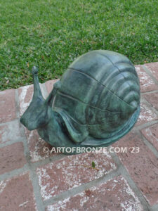 On the Move bronze snail sculpture artwork for outdoor garden or indoor display
