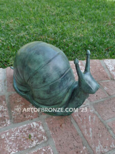 On the Move bronze snail sculpture artwork for outdoor garden or indoor display