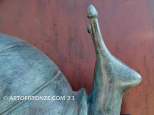 On the Move bronze snail sculpture artwork for outdoor garden or indoor display