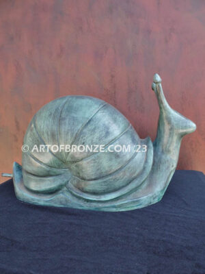 On the Move bronze snail sculpture artwork for outdoor garden or indoor display