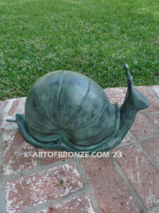 On the Move bronze snail sculpture artwork for outdoor garden or indoor display