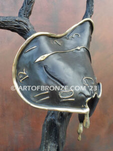 Persistence of Memory Salvador Dali inspired bronze statue of melting watches and clocks