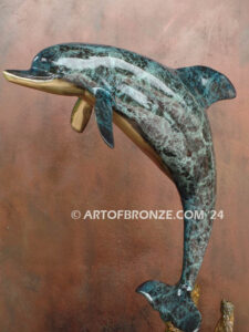 Play Pals dolphin leaping above sea turtle bronze statue