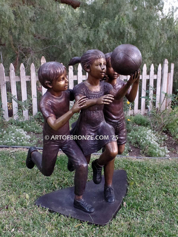 Playing Ball bronze sculpture of children playing basketball