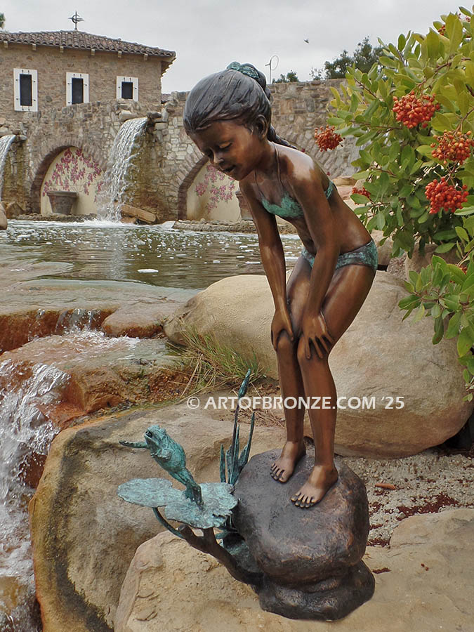 Pond Fun bronze statue of young girl in bathing suit playing with bullfrog