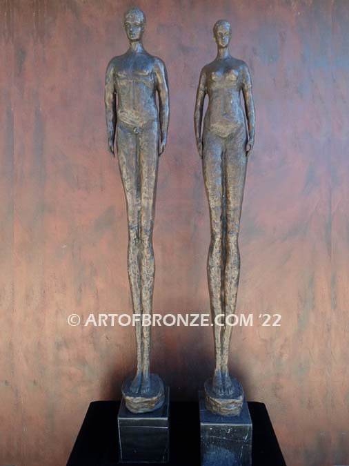 Presence modern bronze sculpture of two elongated male and female figures