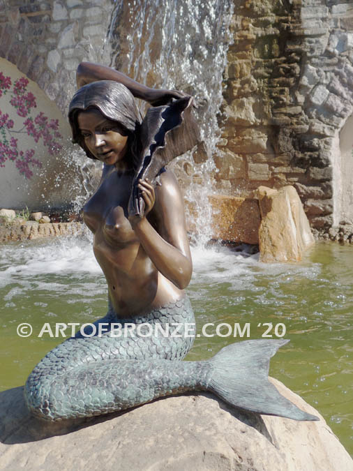 Bronze mermaid fountain sculpture holding sea shell for pond, pool or aquatic display