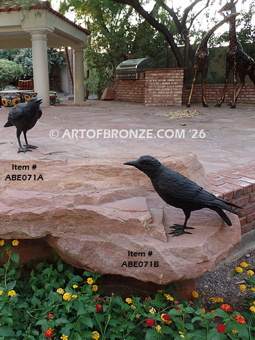 Raven bronze statue of life-size ravens playing