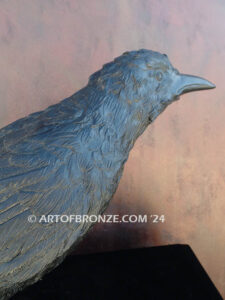Raven Study bronze statue of life-size raven looking straight ahead