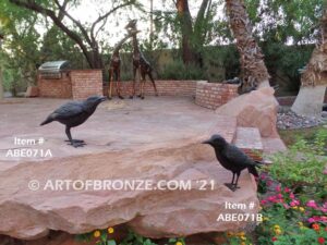 Raven bronze sculpture of standing ravens