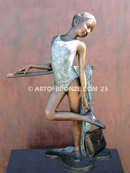 Rehearsal the art of dance and ballet bronze sculpture showcasing ballerina in pose