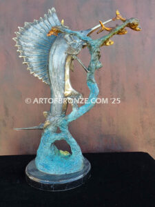 Sailfish Roundup bronze sculpture of sailfish leaping toward school of fish