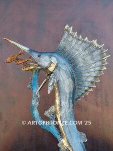 Sailfish Roundup bronze sculpture of sailfish leaping toward school of fish