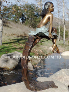 Sanctuary bronze statue beautiful girl gracefully resting on branch in bathing suit