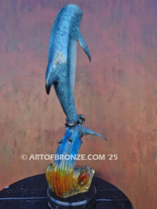 Scenic Route dolphin leaping above waves bronze statue