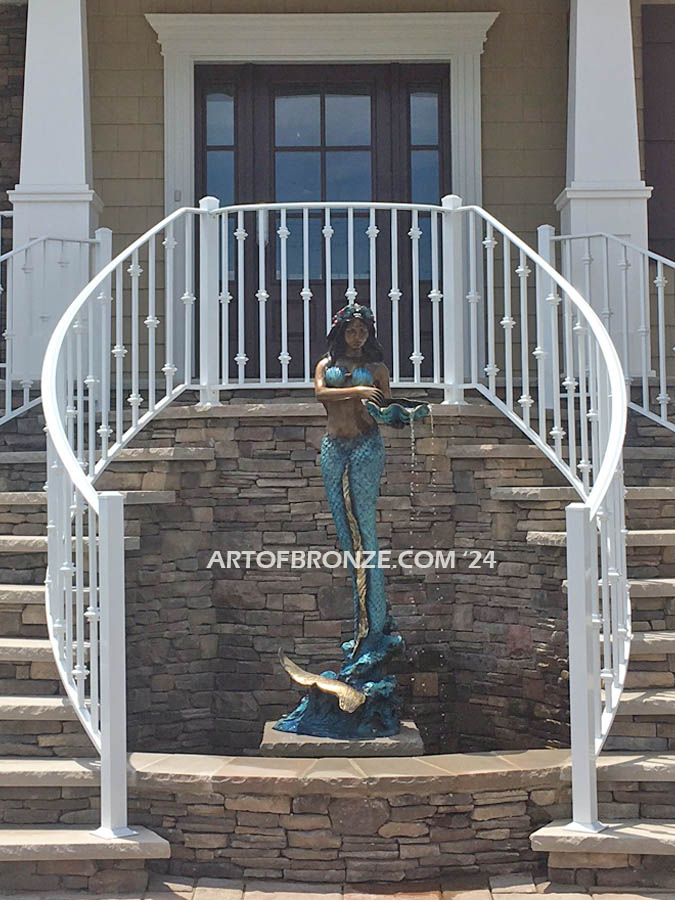 Bronze mermaid sculpture holding oyster shell for pond, pool or aquatic display