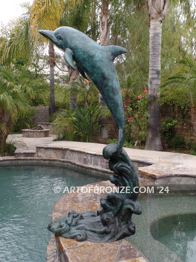 Sea Prancer marine art bronze sculpture dolphin leaping above waves